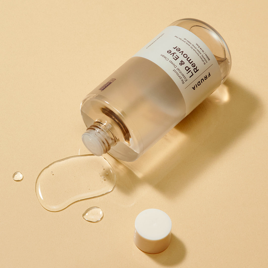 Frudia Re:proust Essential Deep Clean Lip and Eye Makeup Remover in a 300ml bottle, with a clear label and pump dispenser.