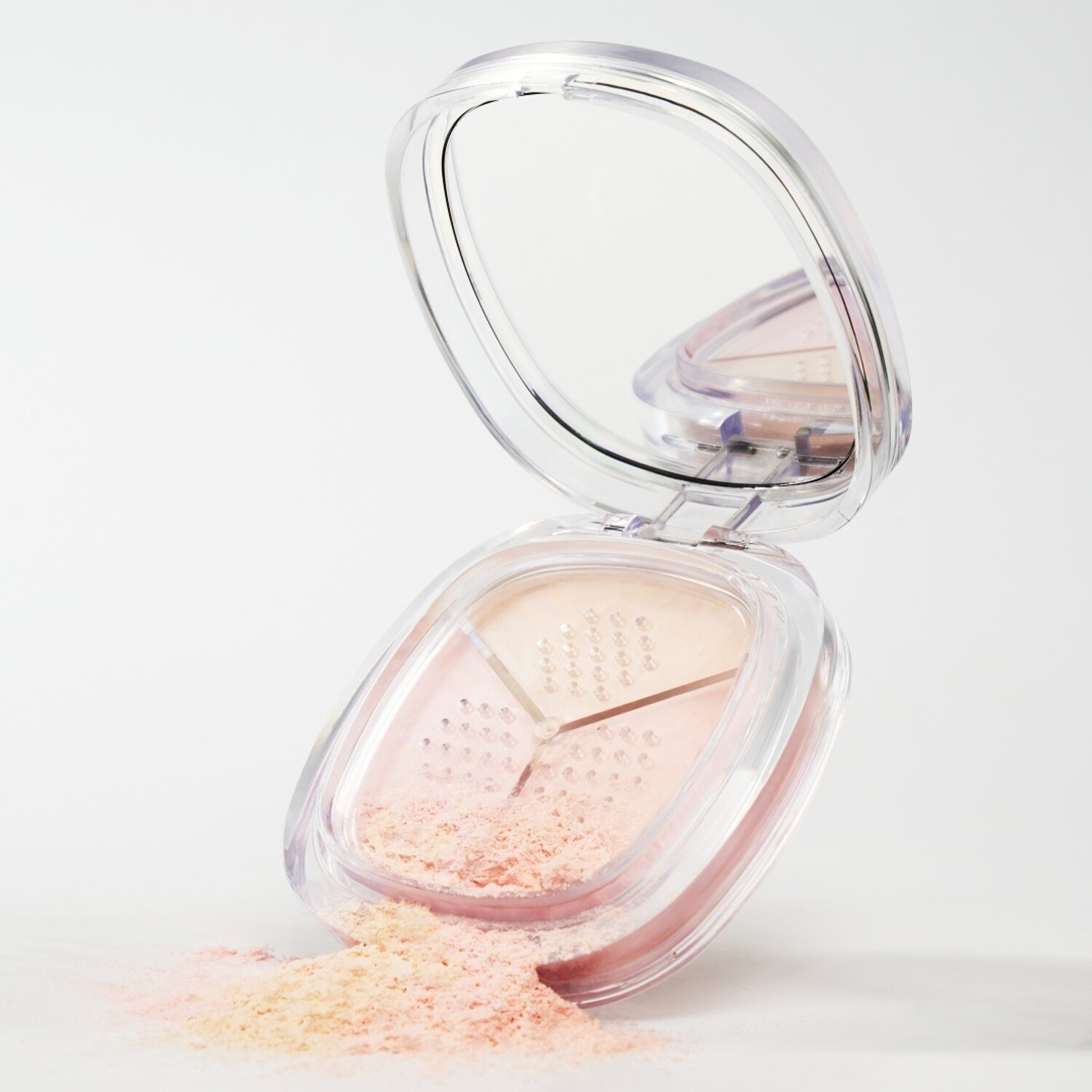 Wakemake Stay Fixer Multi-Color Setting Powder in a compact with a colorful, multi-shade design for setting makeup.