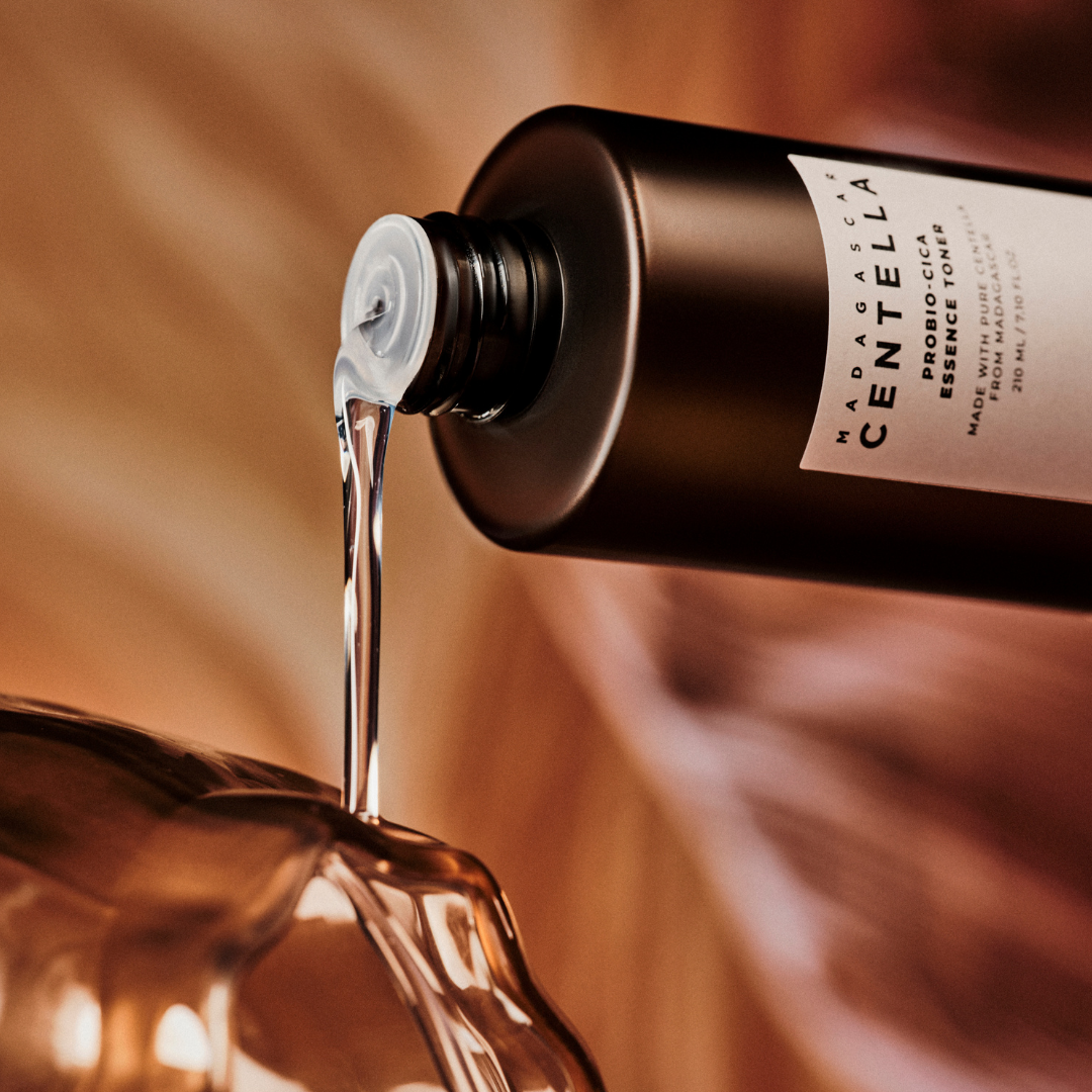 SKIN1004 Madagascar Centella Probio-Cica Essence Toner in a clear 210ml bottle, with a minimalist label and cap.