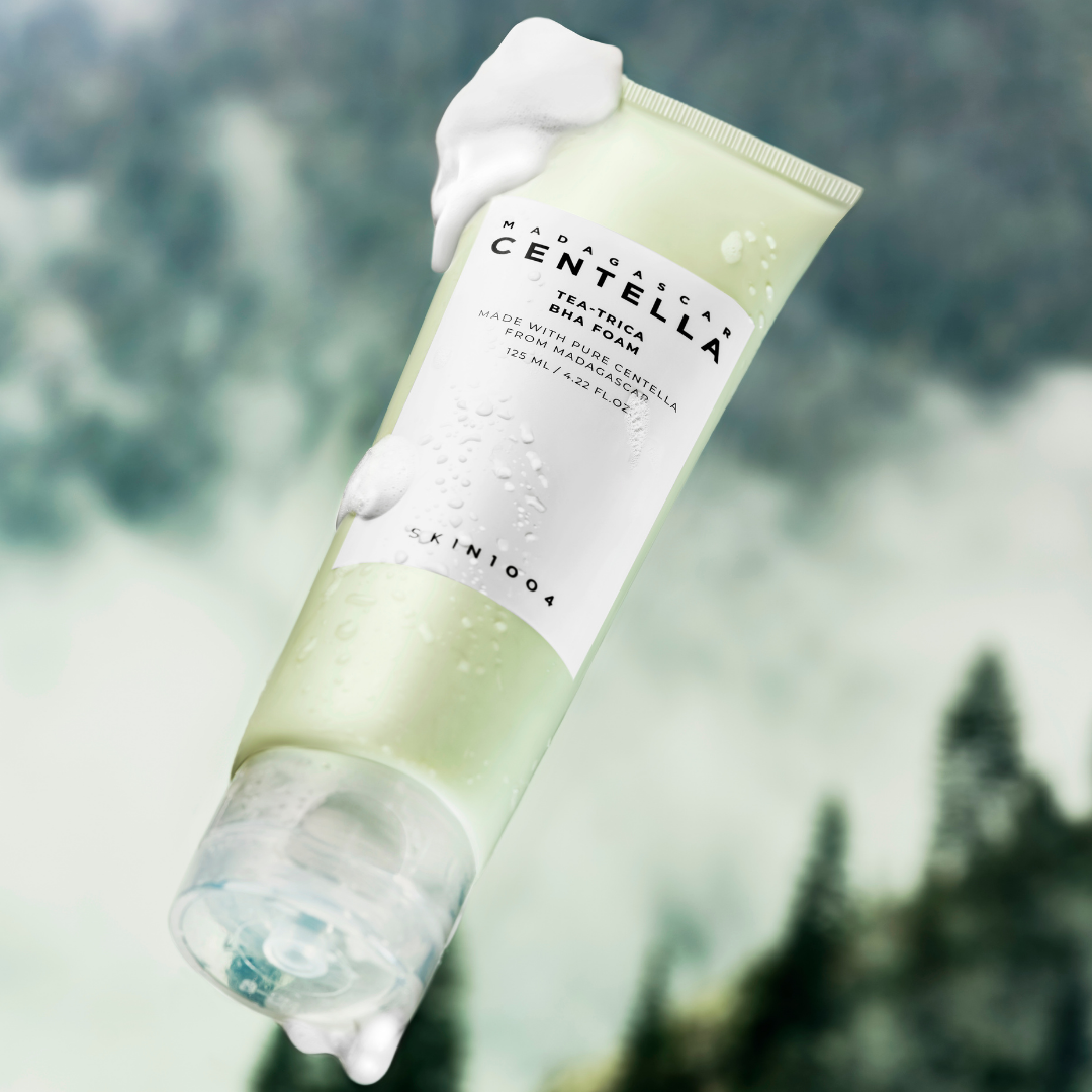 SKIN1004 Madagascar Centella Tea-trica BHA foam cleanser in a 125ml tube, with foaming texture and clean design.