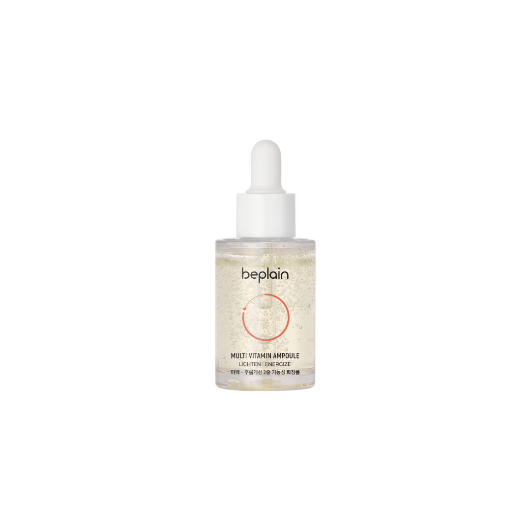 Beplain Multi Vitamin Ampoule 30ml in a clear glass bottle with a white dropper cap, showcasing the skincare product.