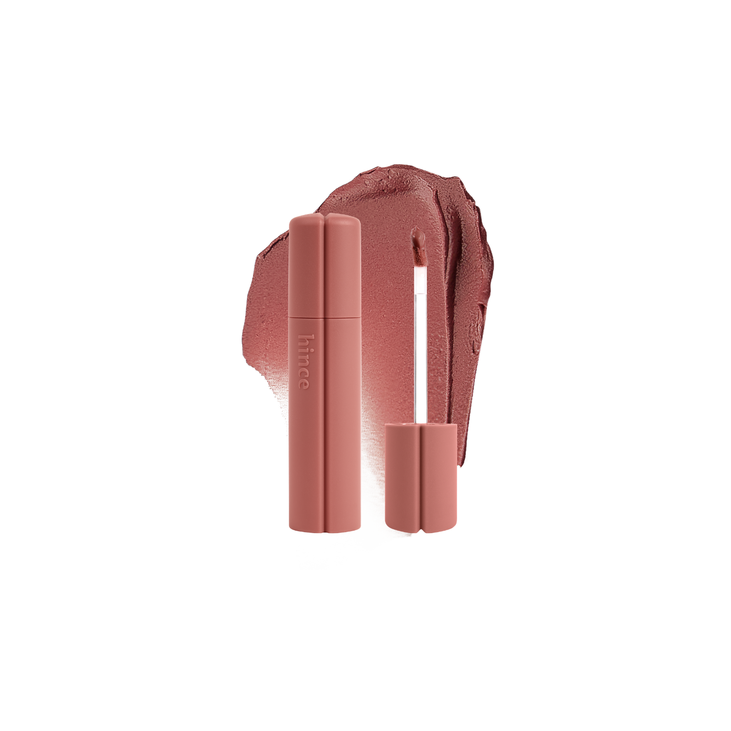 Hince Nu Blur Tint lip tint in a soft pink shade, showing the tube and applicator on a white background for natural lip color.