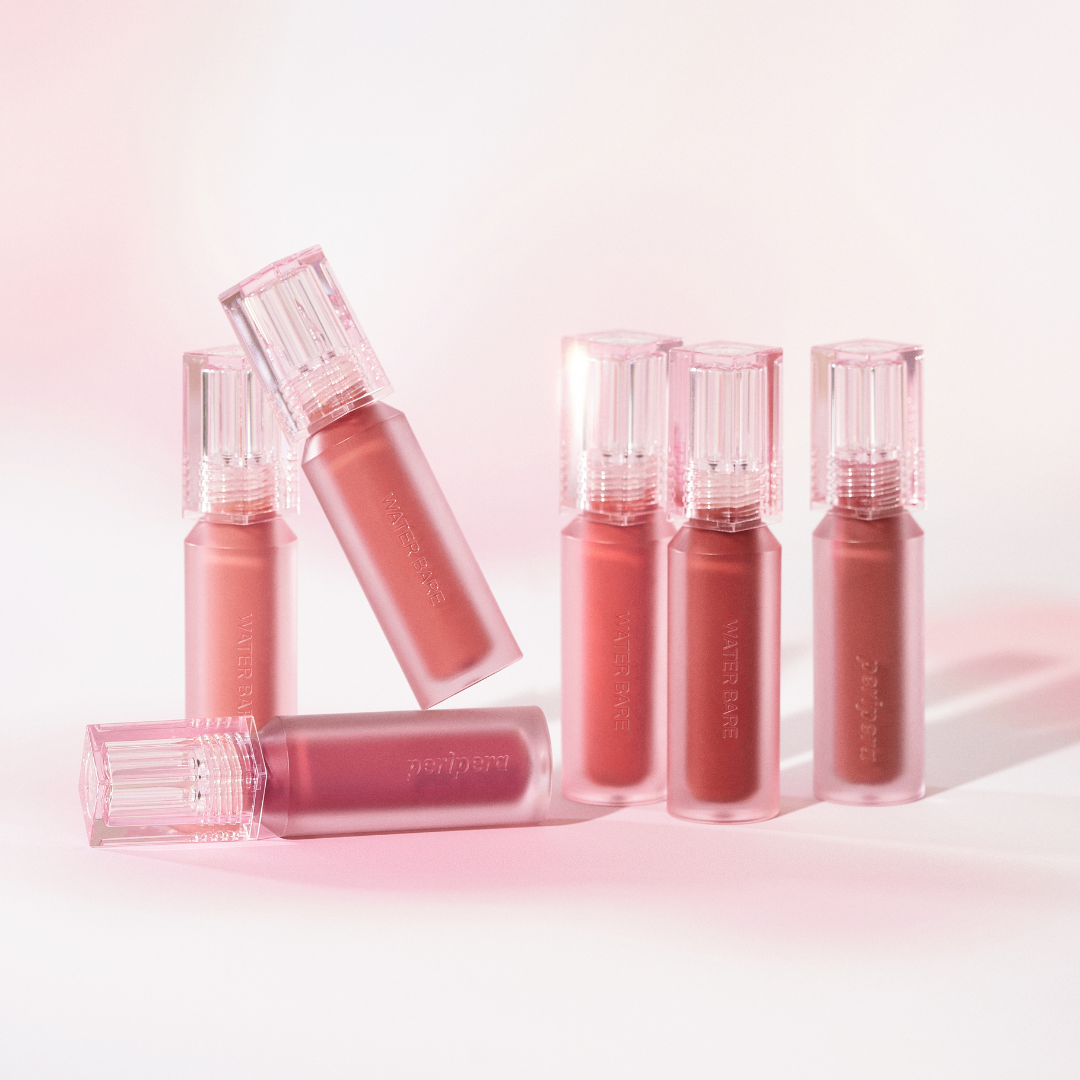 Peripera Water Bare Tint lip tint applied on lips showing a natural, sheer pink color with a glossy finish.