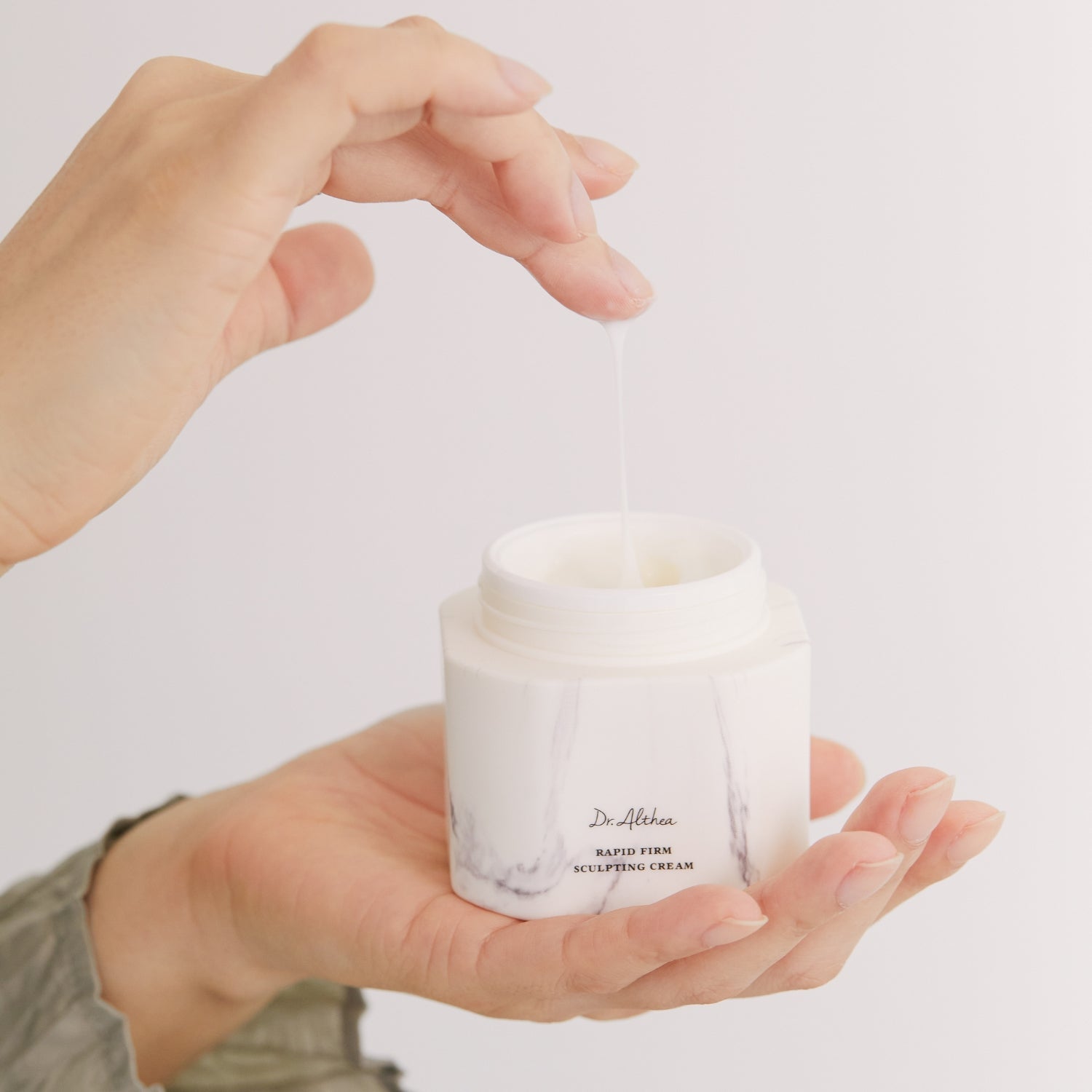 Dr. Althea Rapid Firm Sculpting Cream 45ml face moisturizer showing the cream jar with sleek packaging and product label.