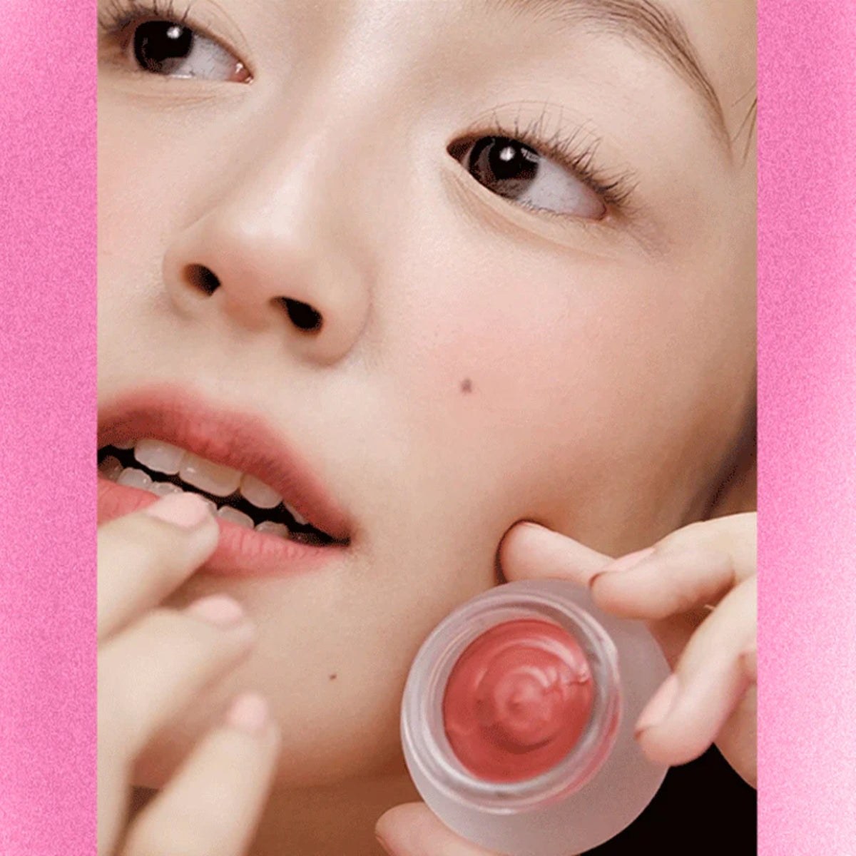 Fwee Lip & Cheek Blurry Pudding Pot blush in a soft, creamy pink shade, displayed in a round jar with a clear lid.