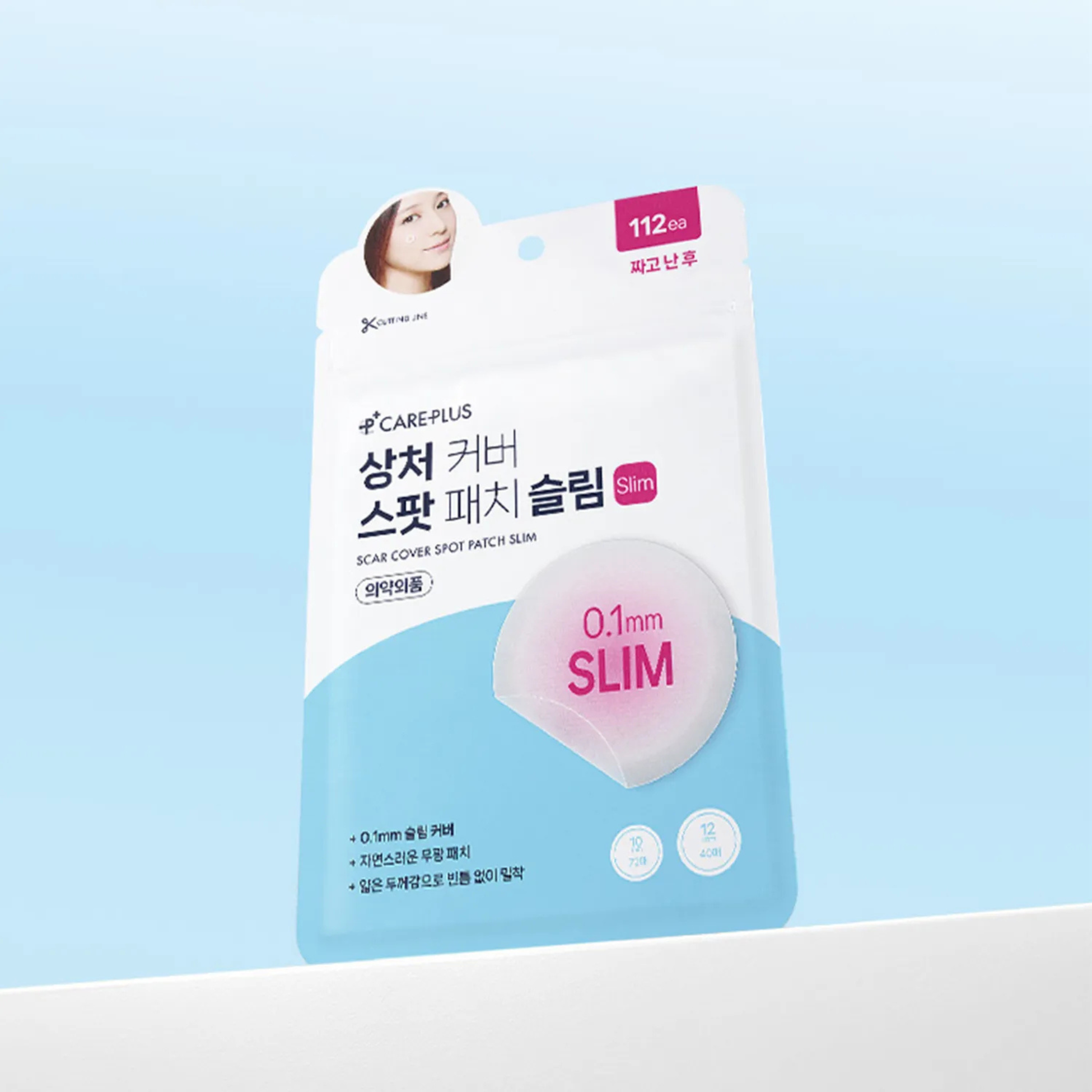 Care Plus Scar Cover Spot Patch Slim, two adhesive patches designed to conceal and protect scars on the skin.
