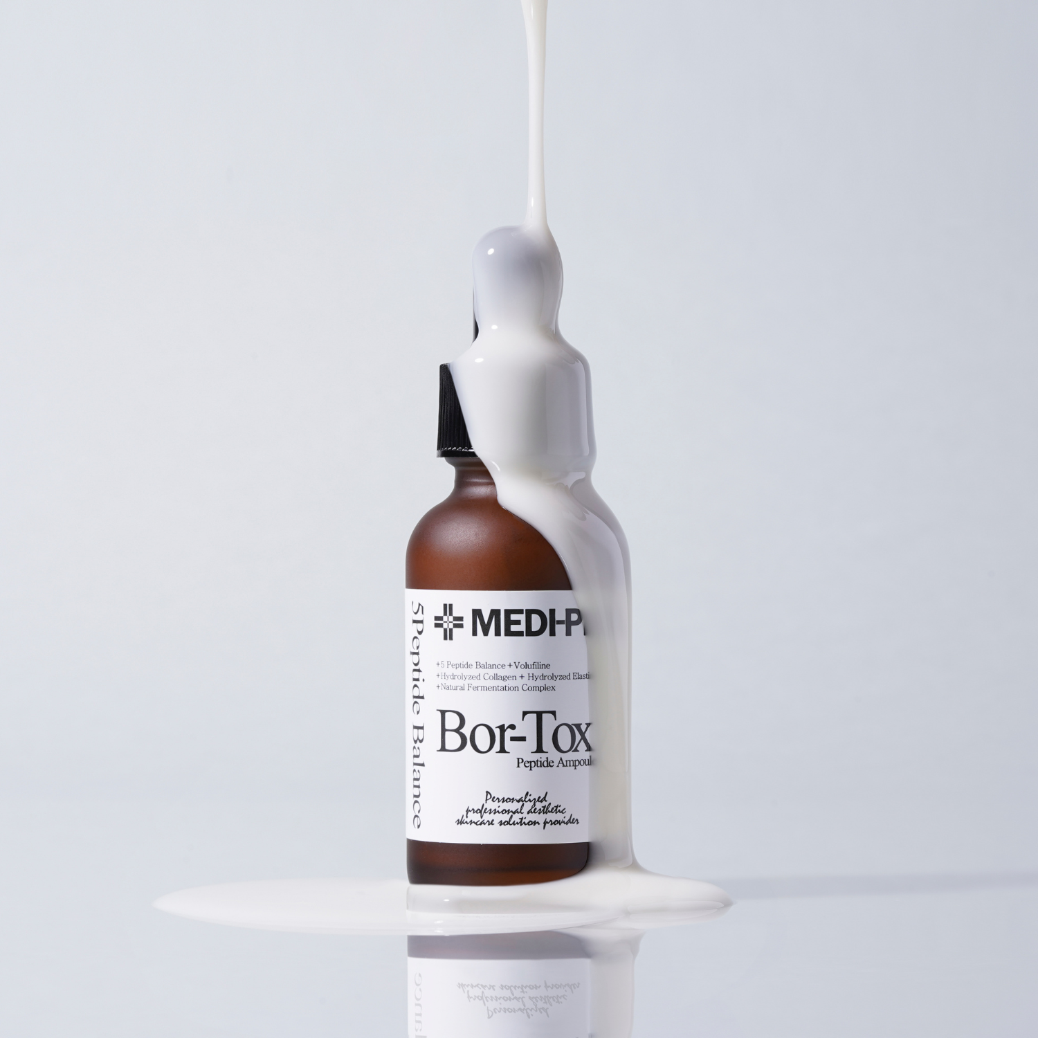 MEDIPEEL+ Peptide Tox Bor Ampoule 30ml, clear glass bottle with dropper, containing a skincare ampoule for anti-aging treatment.