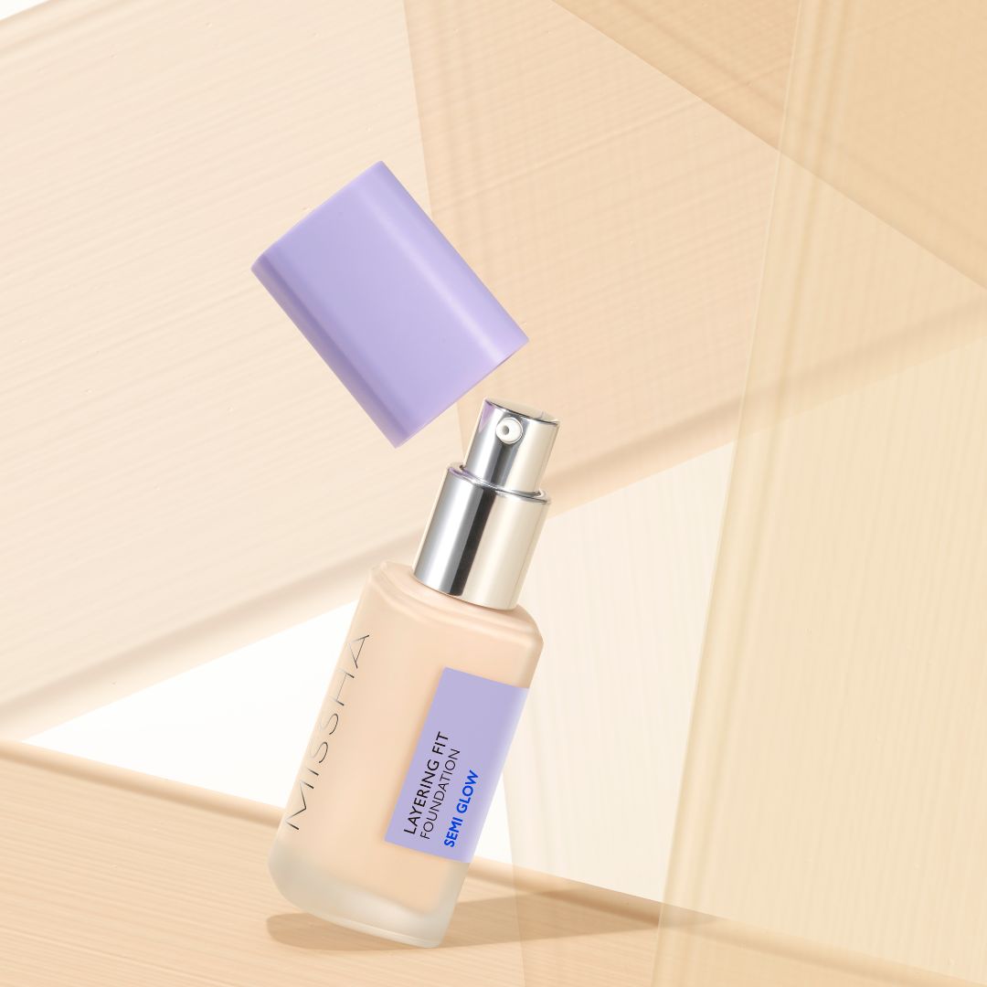 Missha Layering Fit Foundation Semi Glow liquid foundation in a sleek bottle, showcasing its semi-glow finish and smooth texture.