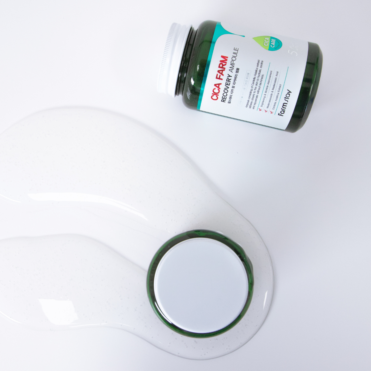 Farmstay Cica Farm Recovery Ampoule in a 250ml bottle, featuring a clear liquid formula with a pump dispenser on a white background.