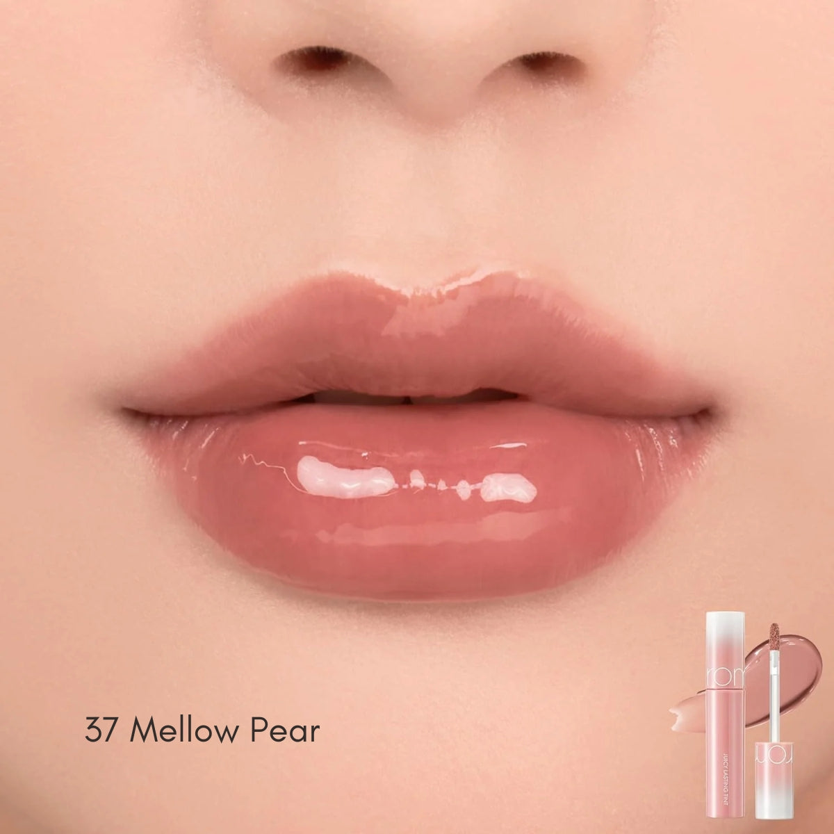 Rom&nd Juicy Lasting Tint lip tint tube with applicator, showing vibrant red color and sleek packaging.