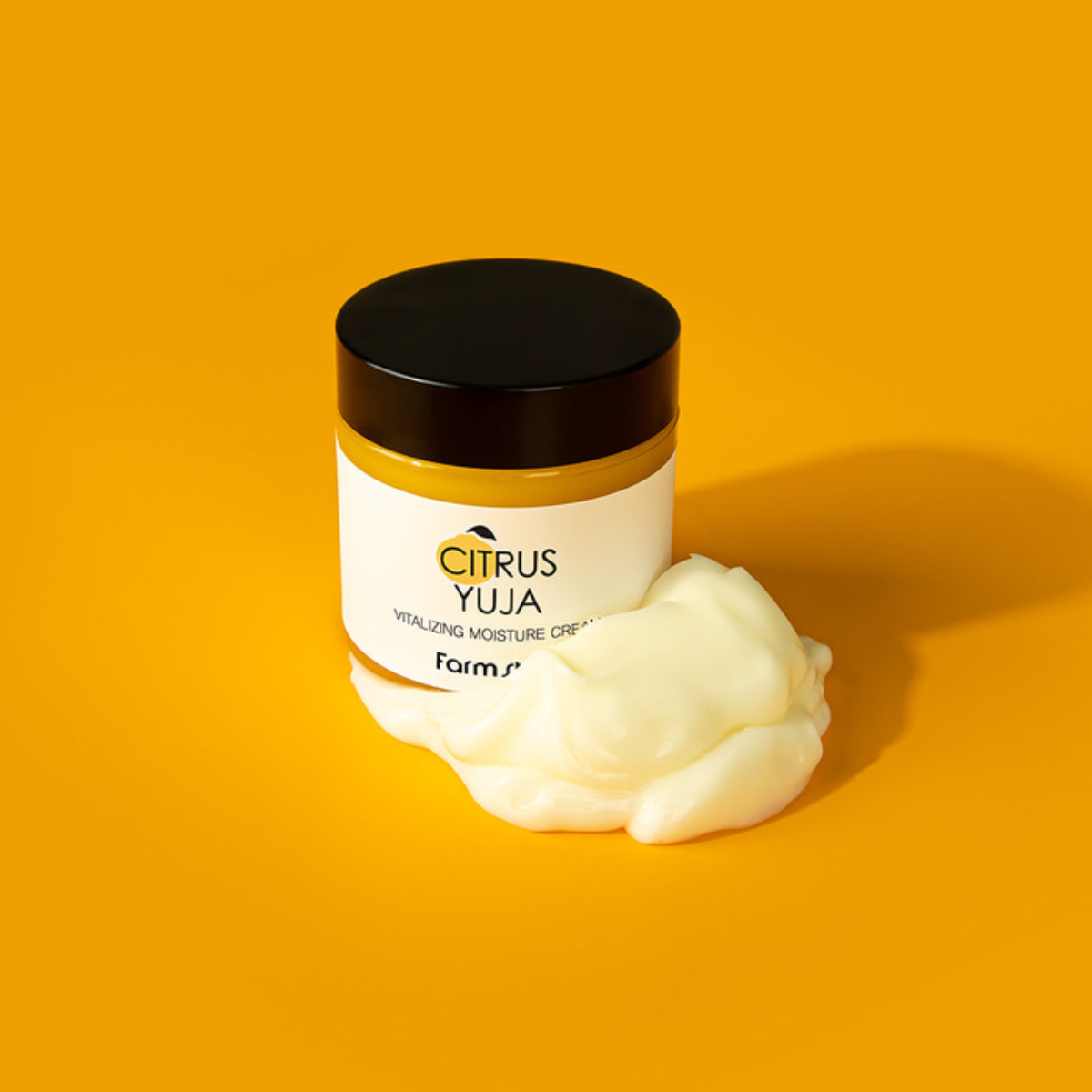 Farmstay Citrus Yuja Vitalizing Moisture Cream 80g face moisturizer jar with orange-colored lid and fresh citrus design