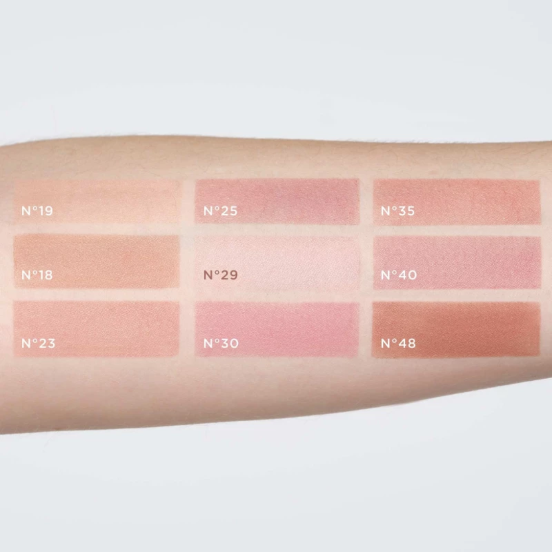 ARTDECO blush with soft pink powder in a round compact, showcasing the blush's smooth texture and natural color.