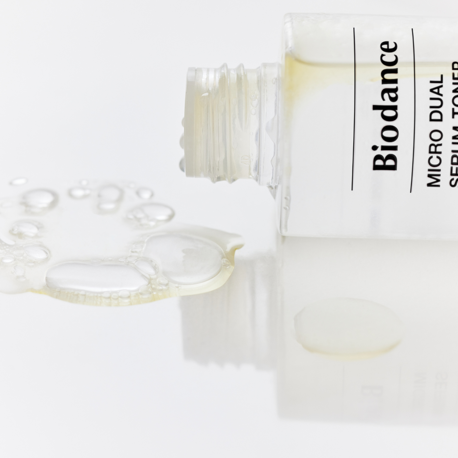 Biodance Micro Dual Serum Toner 150ml bottle with clear liquid and pump dispenser, skincare product for facial toning and hydration.