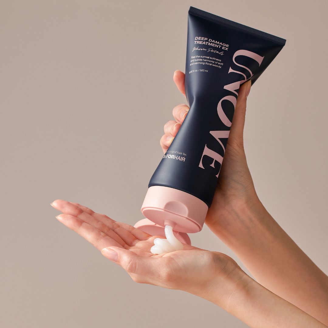 UNOVE Deep Damage Treatment EX conditioner in warm petal scent, 320ml, for repairing and nourishing damaged hair.