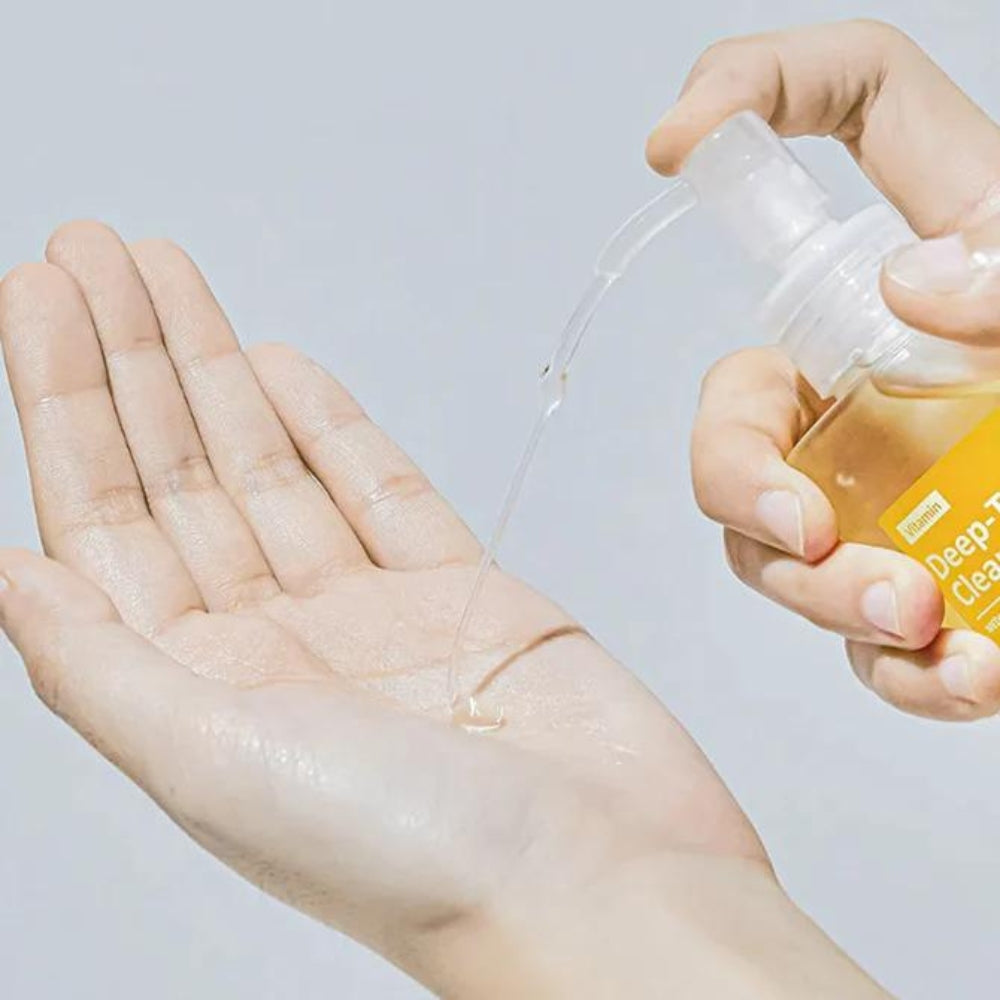 Vegan Vitamin Deep-Tox Cleansing Oil by MEDIPEEL+ in a 200mL bottle, featuring a sleek pump dispenser and clear labeling.