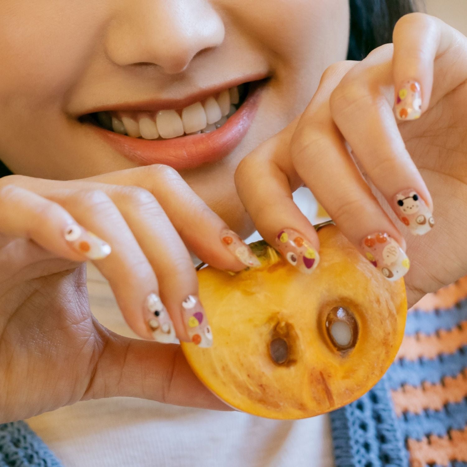 Ohora semi-cured gel nail in N Street Food design featuring vibrant, glossy nail art with colorful street food-inspired patterns.