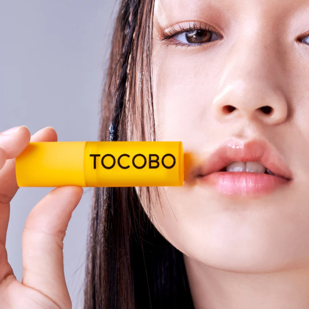 TOCOBO Vitamin Nourishing Lip Balm and Essence in a small jar, showing the creamy texture and packaging.