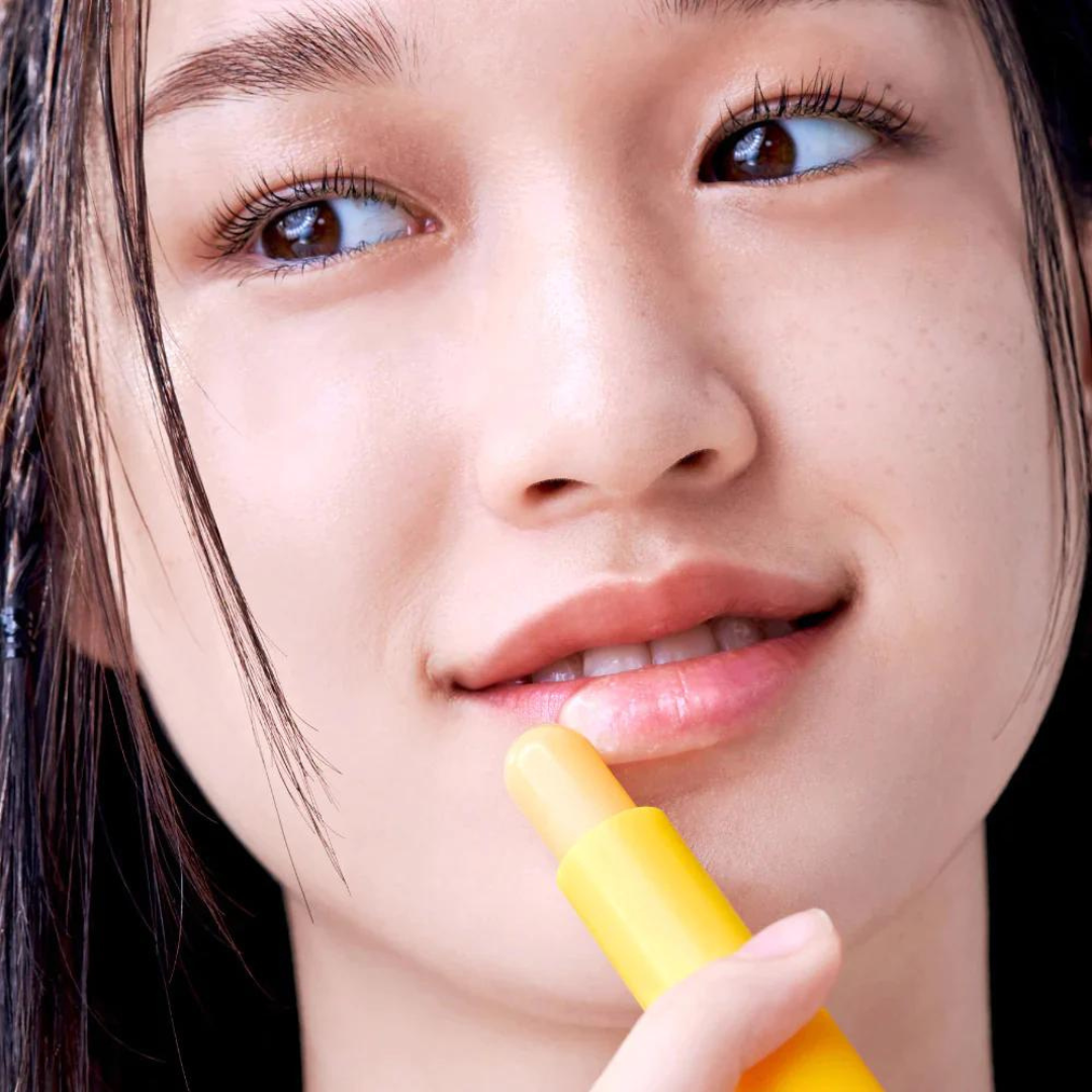 Vitamin Nourishing Lip Balm by TOCOBO, close-up of the sleek tube with a smooth, glossy finish and clear labeling.