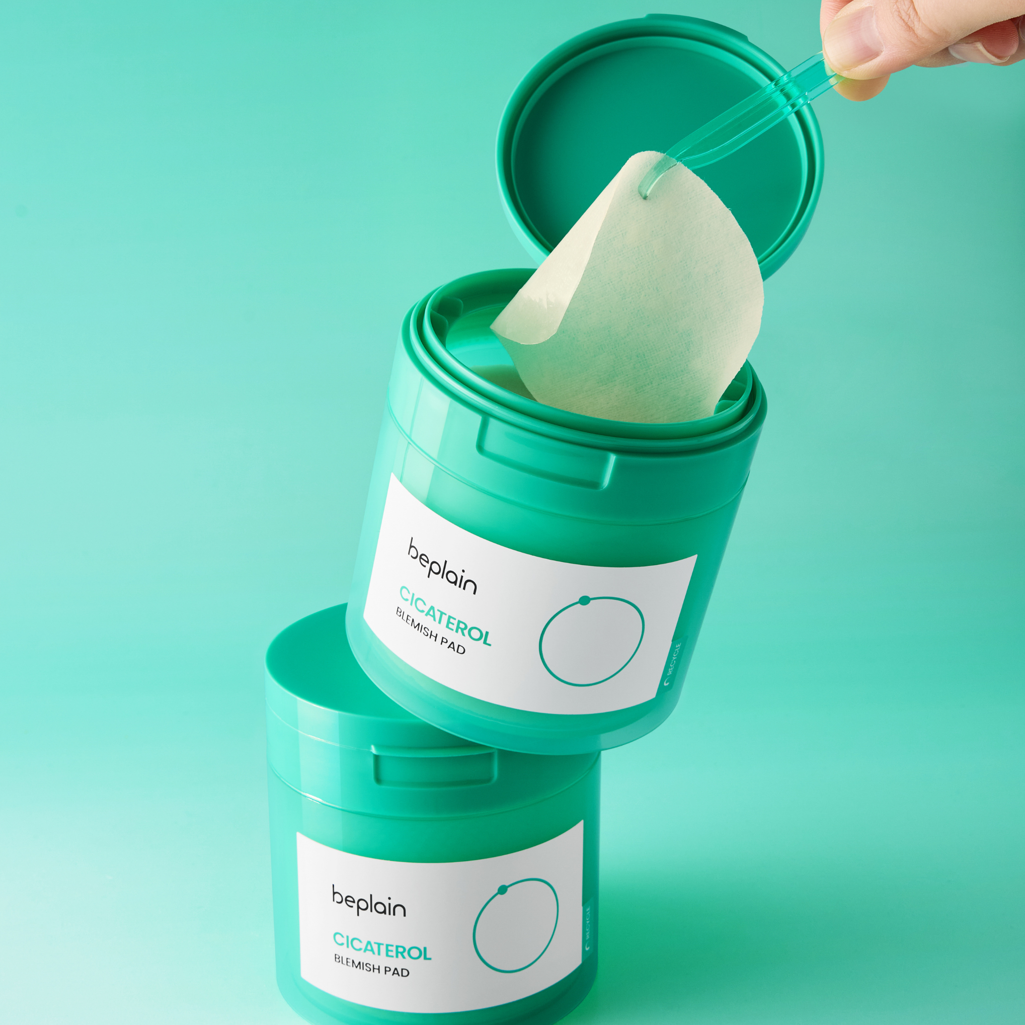 Beplain Cicaterol Blemish Toner Pad with 80 pads, showing textured cotton pads in a clear container for skin blemish treatment.