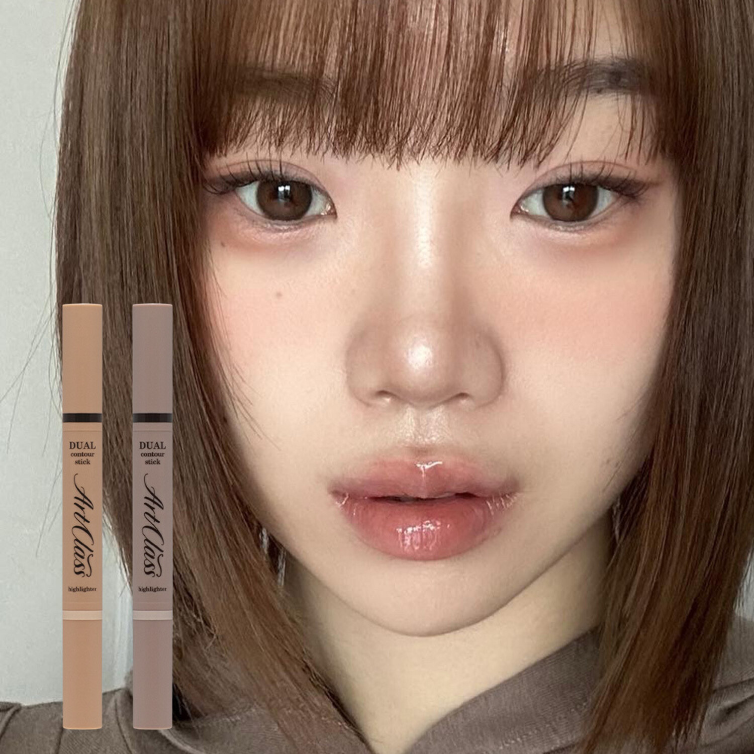 Too Cool For School Artclass By Rodin Dual Contour Stick, cream and darker shade for defining facial contours and highlighting features.