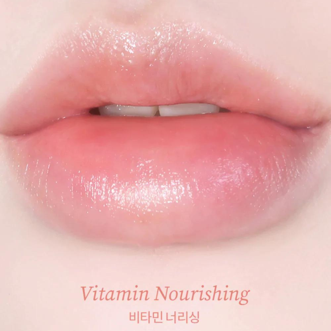 TOCOBO Vitamin Nourishing Lip Balm and Essence tube showing smooth, hydrating lip care product with a sleek design.