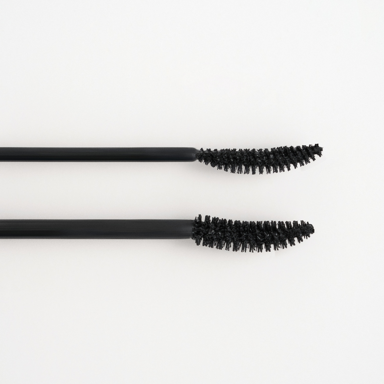 Peripera Ink All Black Cara mascara tube with black cap and sleek packaging, designed for bold, defined lashes.