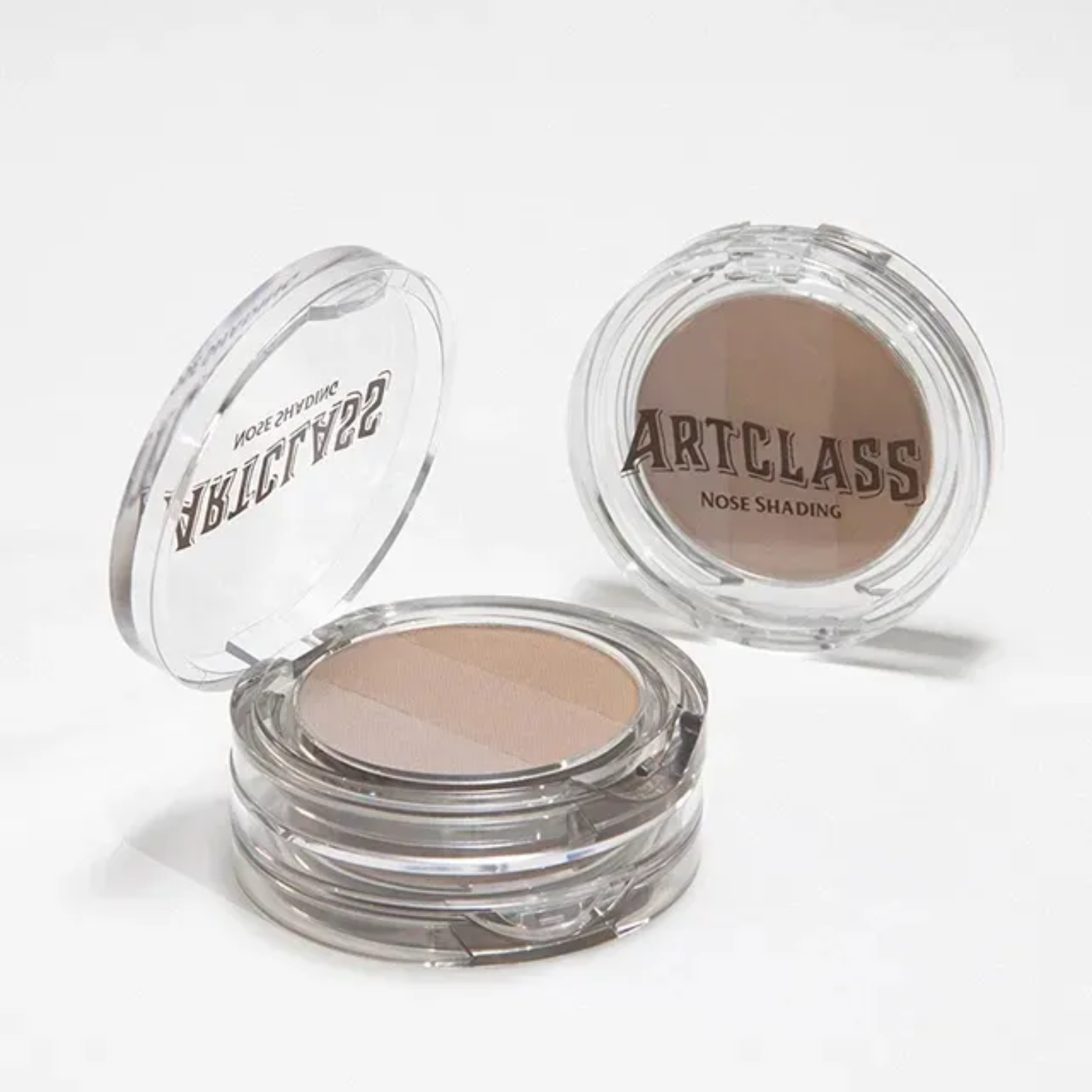 Too Cool For School Artclass By Rodin Nose Shading contour makeup product displayed in a 360-degree view.