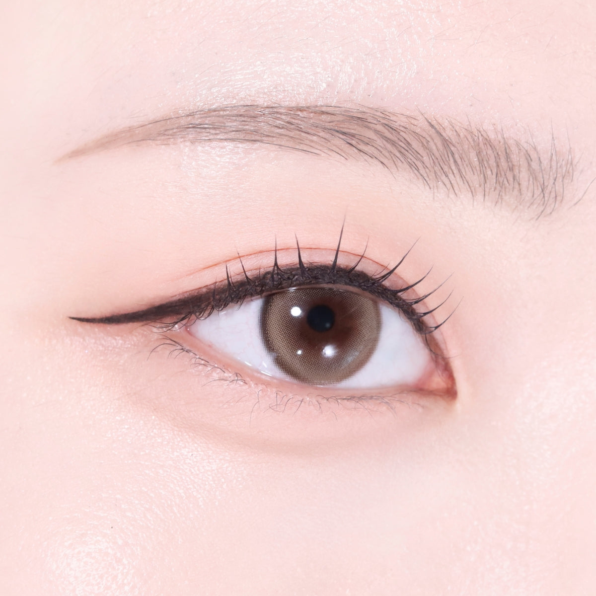 Unleashia Easy Glide Flat Liquid Eyeliner pen with black ink, showing the sleek applicator tip and smooth liquid formulation.