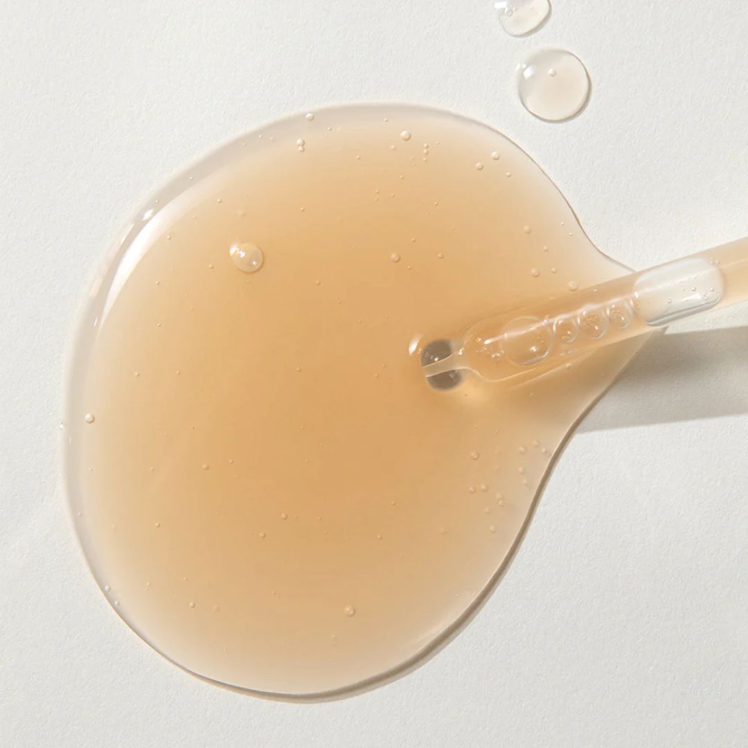 Kaine Kombu Barrier Ampoule 30ml in a clear glass bottle with a pump dispenser, showing the skincare product on a white background.