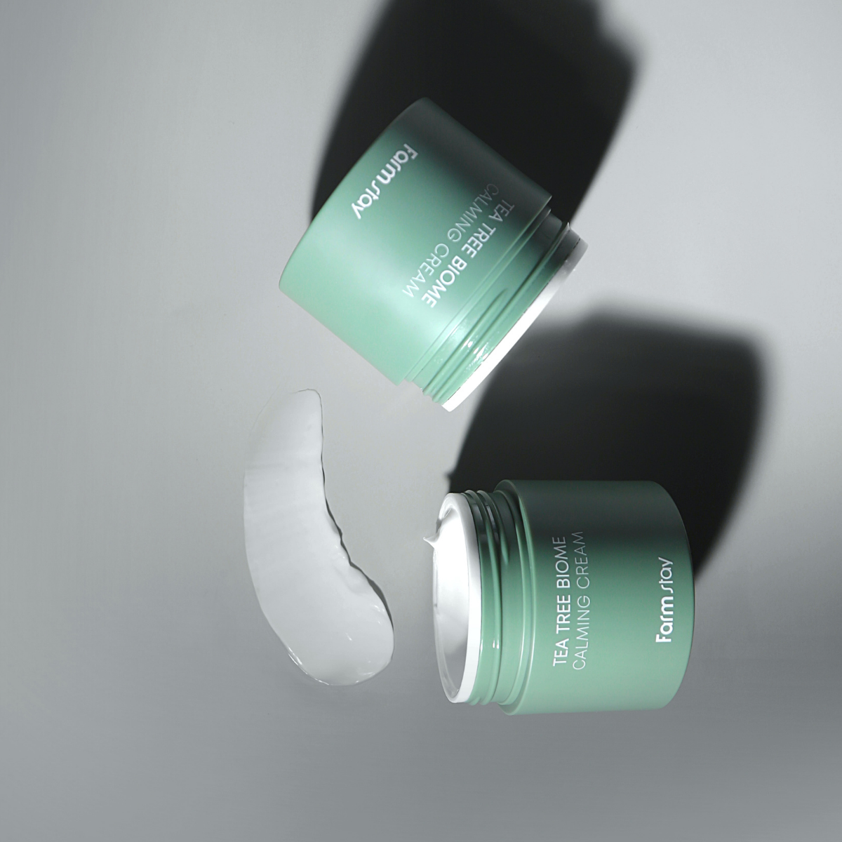 Farmstay Tea Tree Biome Calming Cream in 80ml jar, soothing face moisturizer with natural tea tree ingredients.