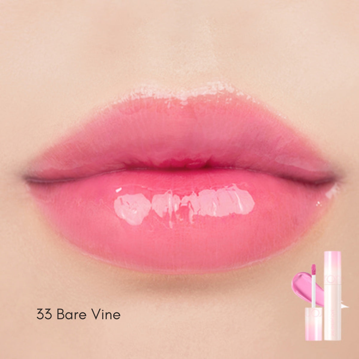 Rom&nd Juicy Lasting Lip Tint in a vibrant pink shade, showing the sleek tube and applicator with smooth, glossy color.
