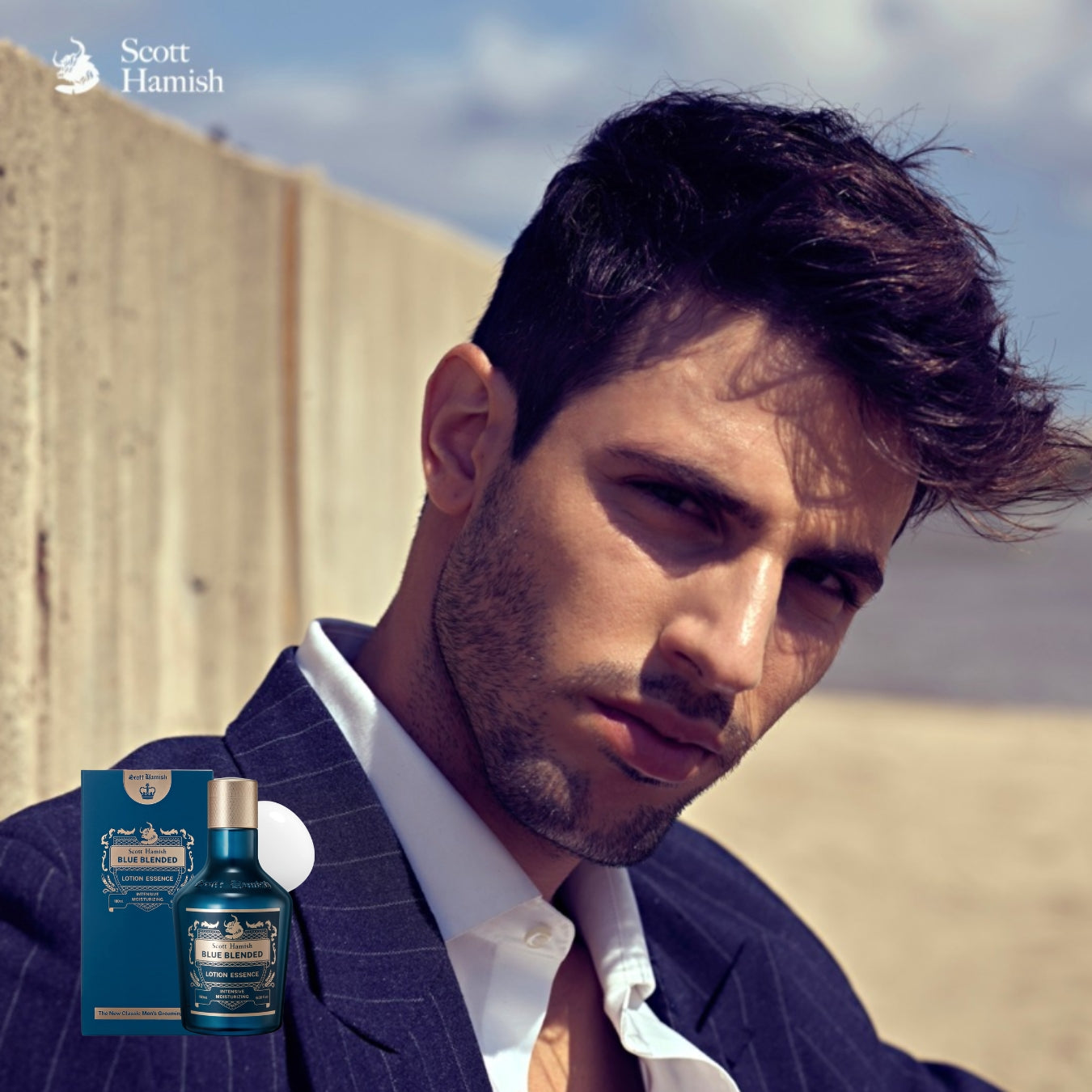 Blue Scott Hamish blended lotion essence bottle, 180ml, with clear label and blue cap, on a white background.