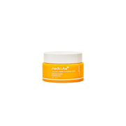 Medicube Kojic Acid Turmeric Vita Capsule Cream face moisturizer in a jar, showcasing the creamy texture and golden turmeric hue.
