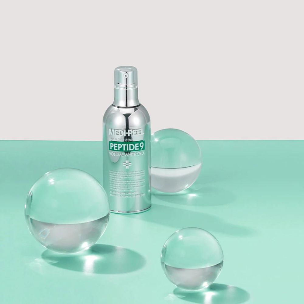 MEDIPEEL+ Peptide 9 Volume White Cica Essence bottle with white and blue packaging, 100mL, close-up view of the product.