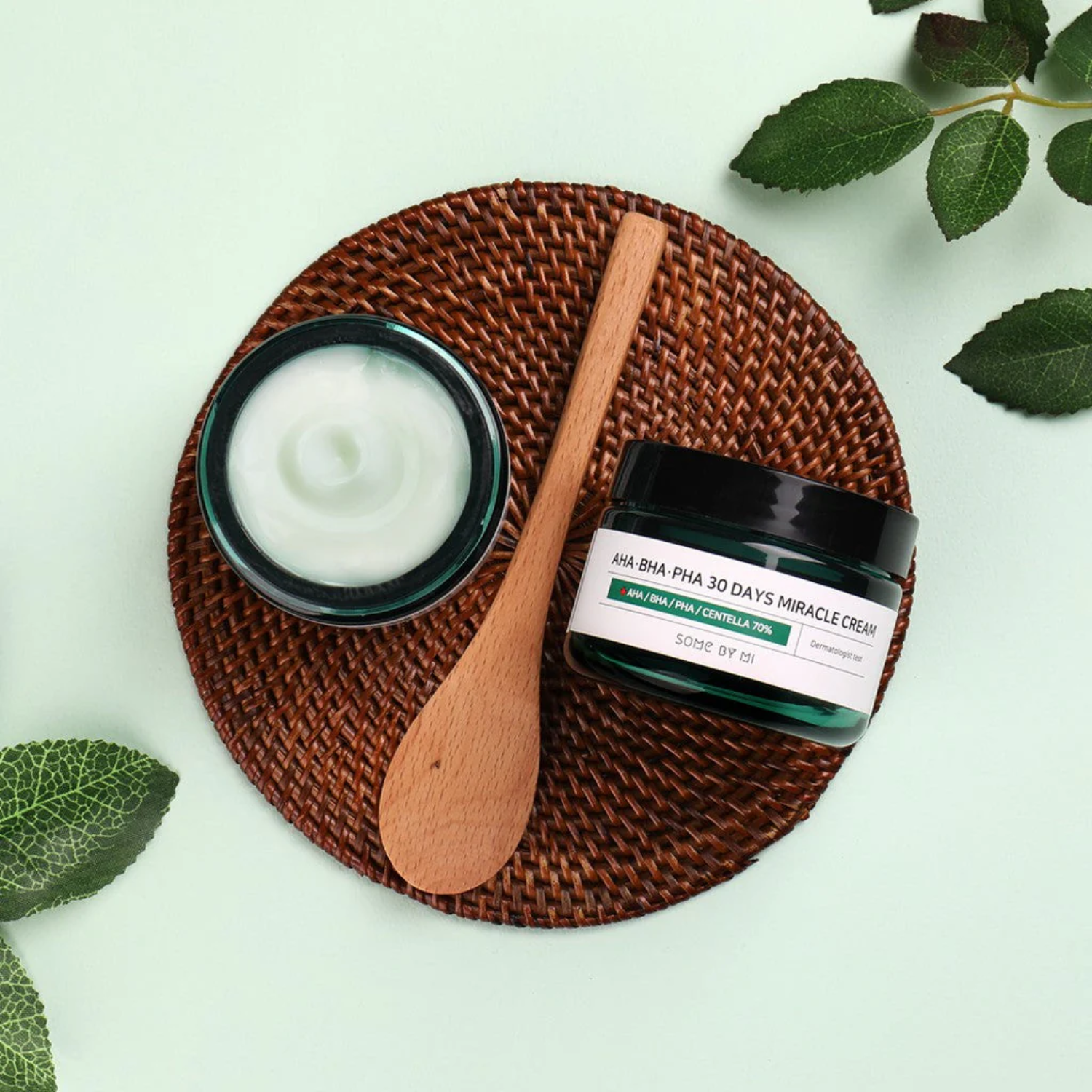 Some By Mi AHA BHA PHA 30 Days Miracle Cream 60g face moisturizer with a sleek jar, designed to hydrate and clarify skin.