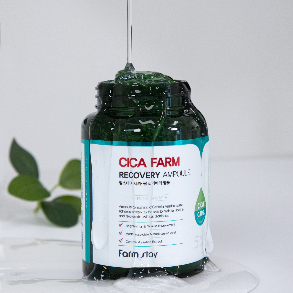 Farmstay Cica Farm Recovery Ampoule 250ml with soothing, healing ingredients in a clear bottle, suitable for sensitive skin.
