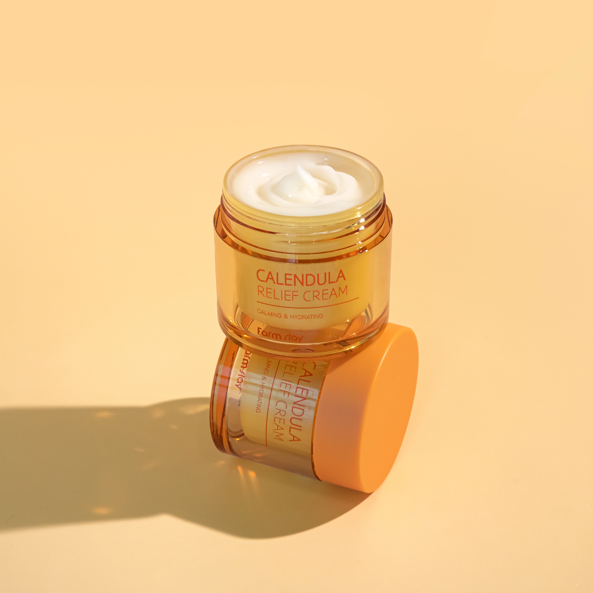 Farmstay Calendula Relief Cream, 80ml face moisturizer with soothing calendula for calming and nourishing skin.