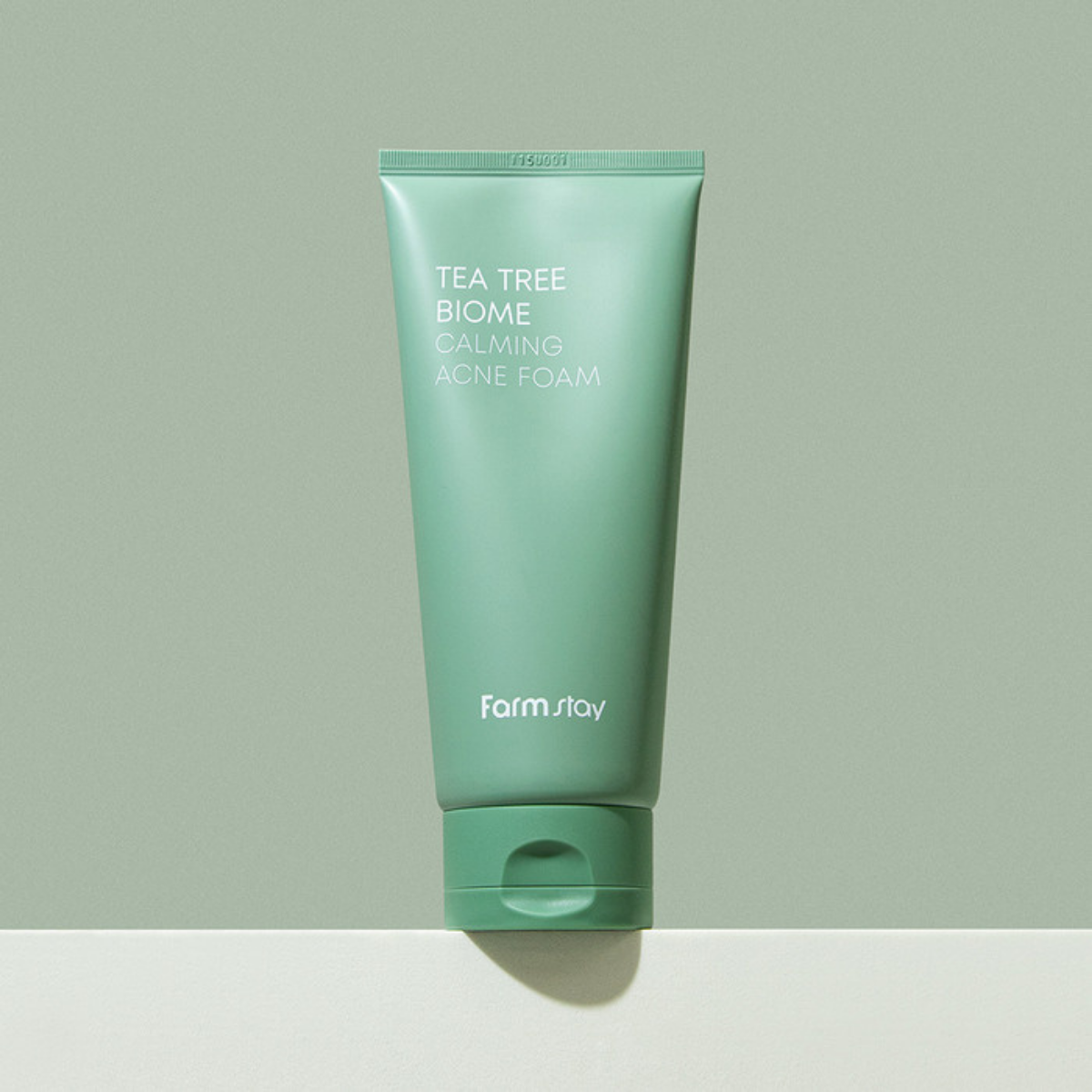 Farmstay Tea Tree Biome Calming Acne Foam in 180ml, gentle gel cleanser with tea tree for calming acne-prone skin.