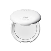 Missha Airy Pot Pressed Powder setting powder compact with open lid, showcasing the lightweight pressed powder inside.