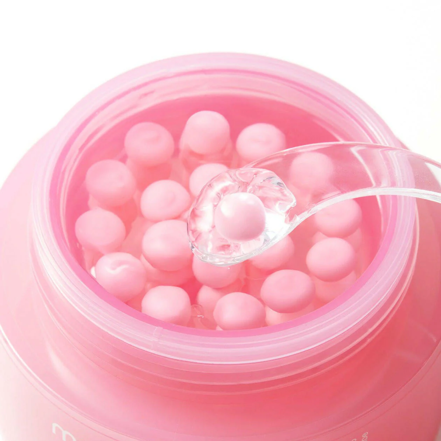 Medicube PDRN Pink Collagen Capsule Cream face moisturizer jar showing the pink container and cream inside