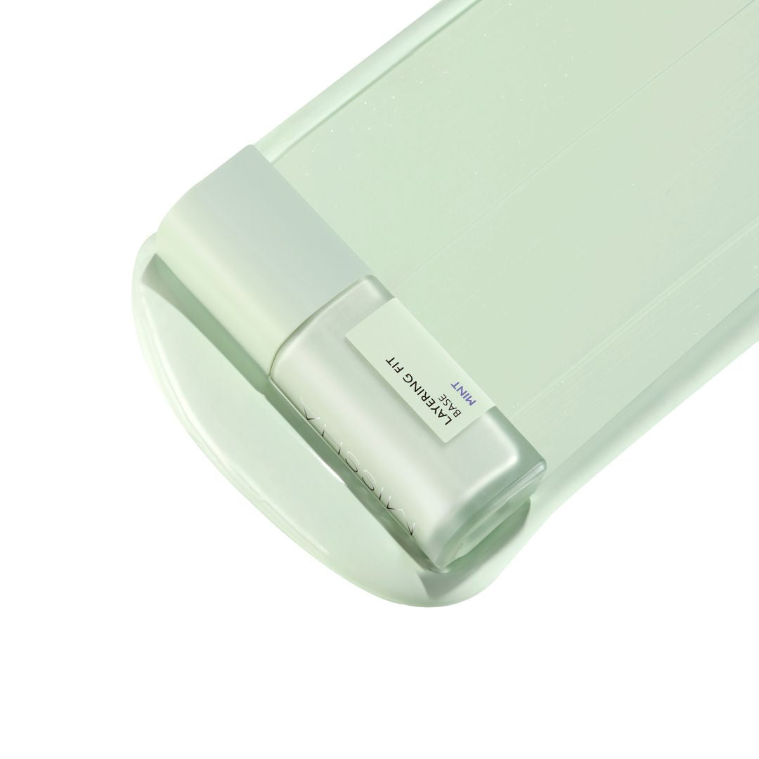 Missha Layering Fit Face Primer in a sleek tube, showing smooth, lightweight texture for even skin prep.