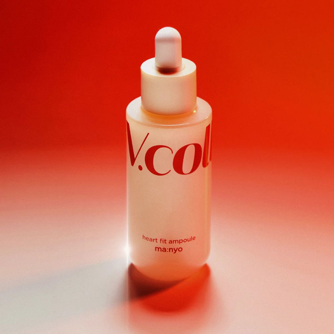 Ma:nyo Vcollagen Heart Fit Ampoule 50ml, clear glass bottle with dropper for skincare treatment, featuring vibrant packaging.