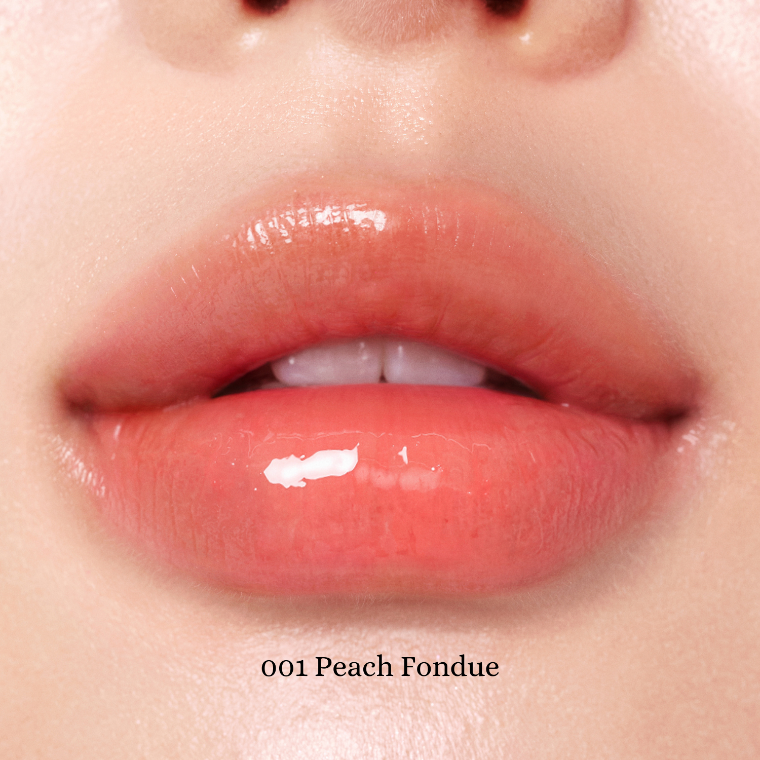 Peripera Heart Jam Glow Lipstick in a vibrant pink shade, showing the lipstick bullet and glossy finish.