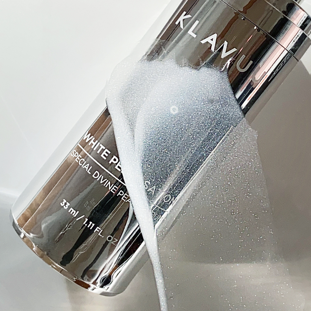 Klavuu Pearlsation Special Divine Pearl Serum 33ml bottle with white pearls, showcasing luxurious skincare for radiant skin.