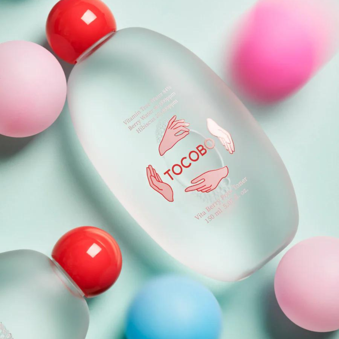 Vita Berry Pore Toner by TOCOBO in a 150ml clear bottle, with vibrant berry imagery and a white cap.