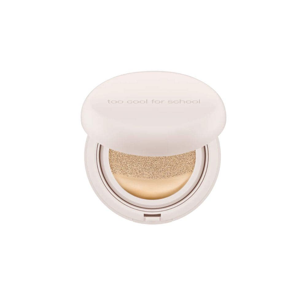 Too Cool For School fixing nude cushion foundation with refill, close-up of the cushion compact showing the product and packaging.