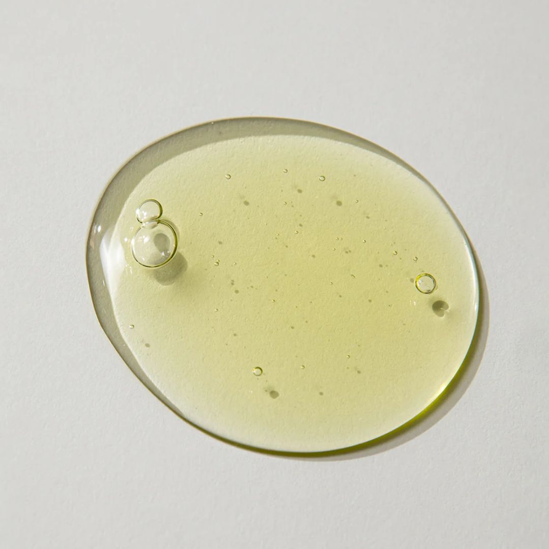 KAINE Rosemary AHA Night Serum 30ml bottle with dropper, clear glass container showing the serum inside.