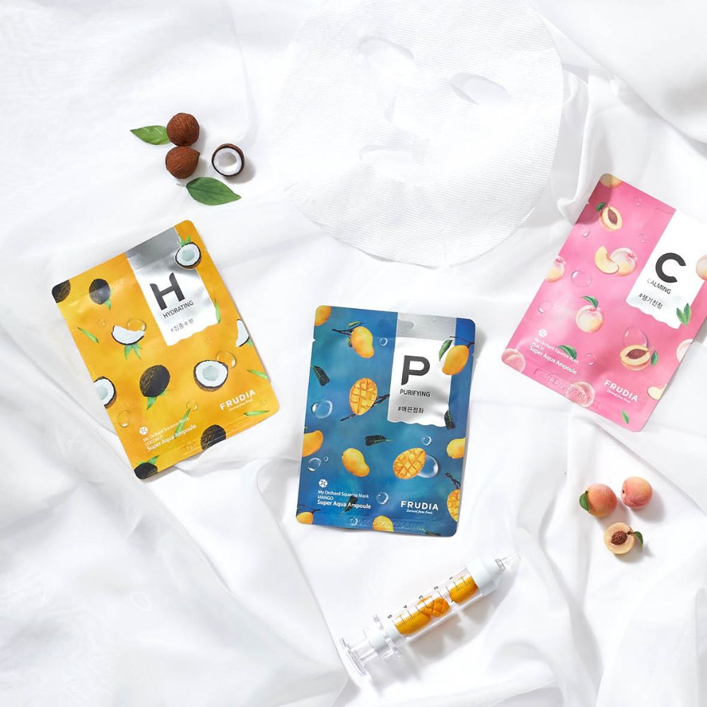 Frudia My Orchard Squeeze Peach vegan sheet mask showing peach-scented mask with peach illustrations on packaging.
