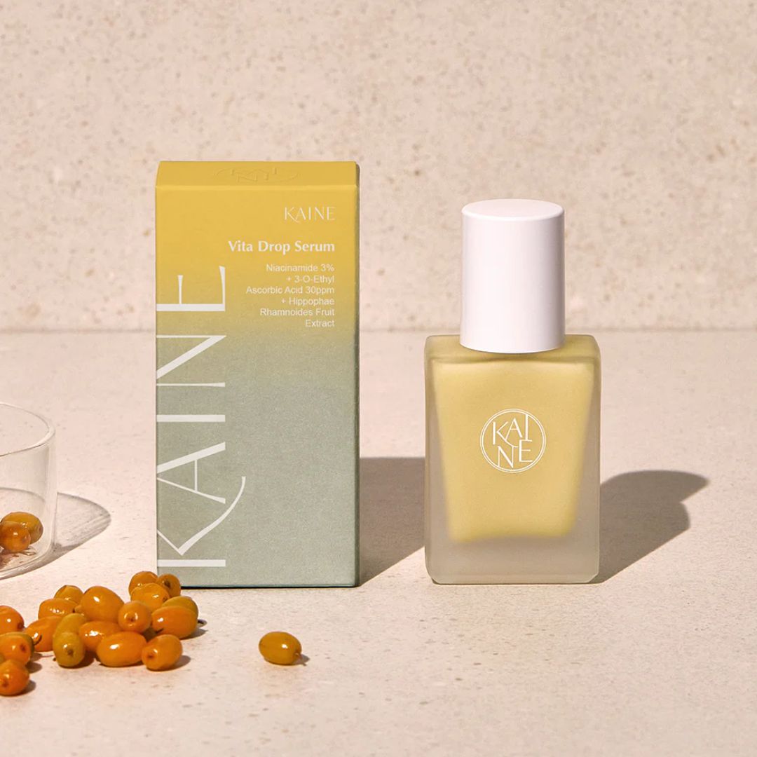 KAINE Vita Drop Serum 30ml bottle with dropper, clear liquid serum for skincare, shown in a close-up image.