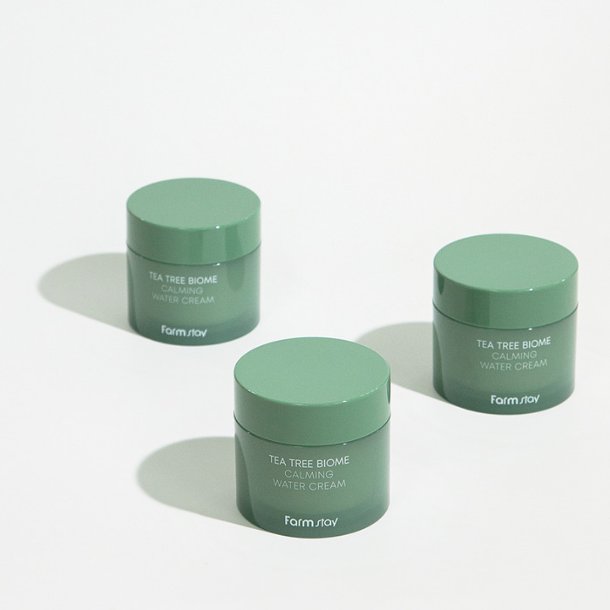 Farmstay Tea Tree Biome Calming Water Cream face moisturizer in 80ml jar, with a smooth, hydrating texture and calming ingredients.